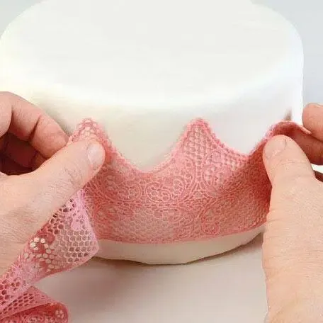 Essbare Tortenspitze